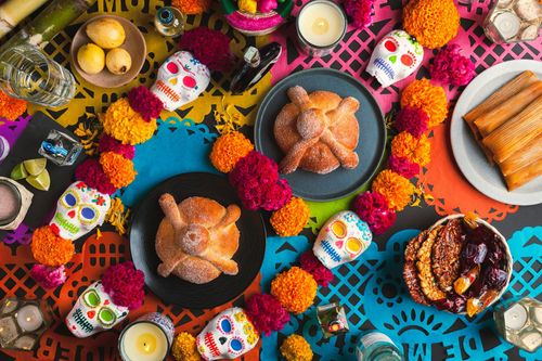 Pan de Muerto: A sweet bread, in The Day of the Dead, or Día de los Muertos in Spanish, shaped round with bone-like decorations and sugar on top with flavors like orange zest or anise.