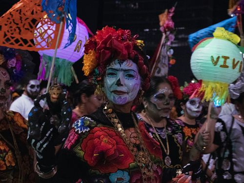 Día de los Muertos, in Oaxaca, Mexico, is a mixture of laughter and dance.