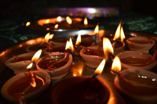 People light up diyas, which are little lamps that represent knowledge shining bright against ignorance.