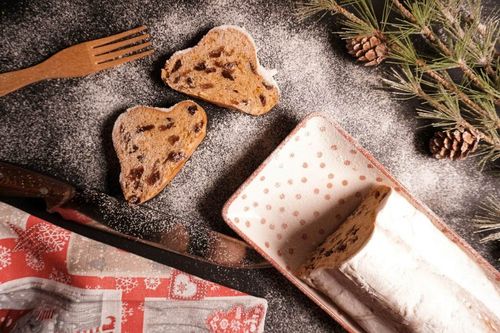 Stollen is the favorite holiday treat, sweet bread with fruit and powdered sugar