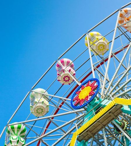 Ferris Wheel Against Blue Sky 