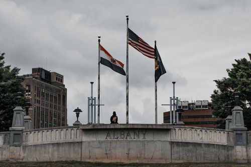 woman sitting in a plaza in Albany