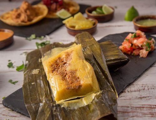 In Mexico, a traditional Christmas Eve dinner​ includes Tamales, steamed masa dough with fillings,