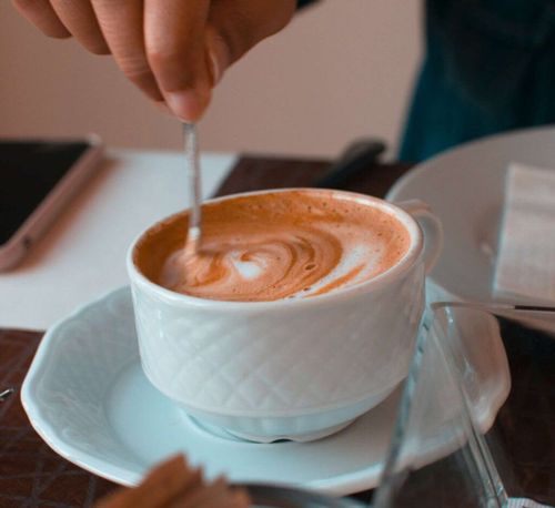 Savor the simplicity of a cappuccino and bask in the tranquility of the morning.