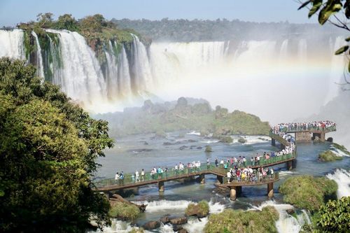 According to the South America travel guide, the Iguazu Falls is one of the world's most stunning waterfalls, located on the border between Brazil and Argentina.